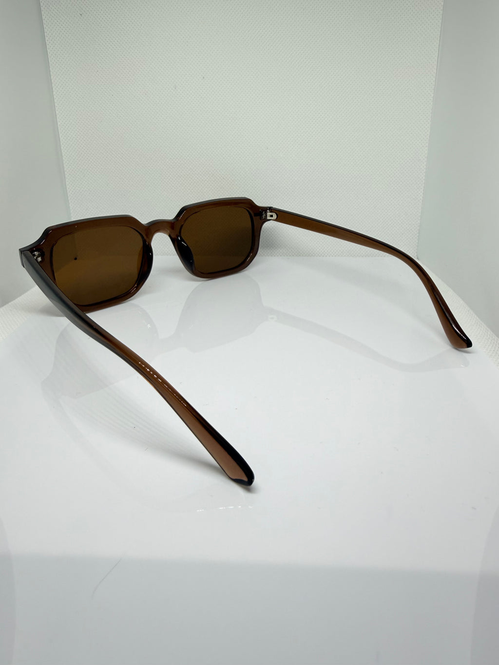 Mocha brown sunglasses with a clean rectangular shape for everyday wear