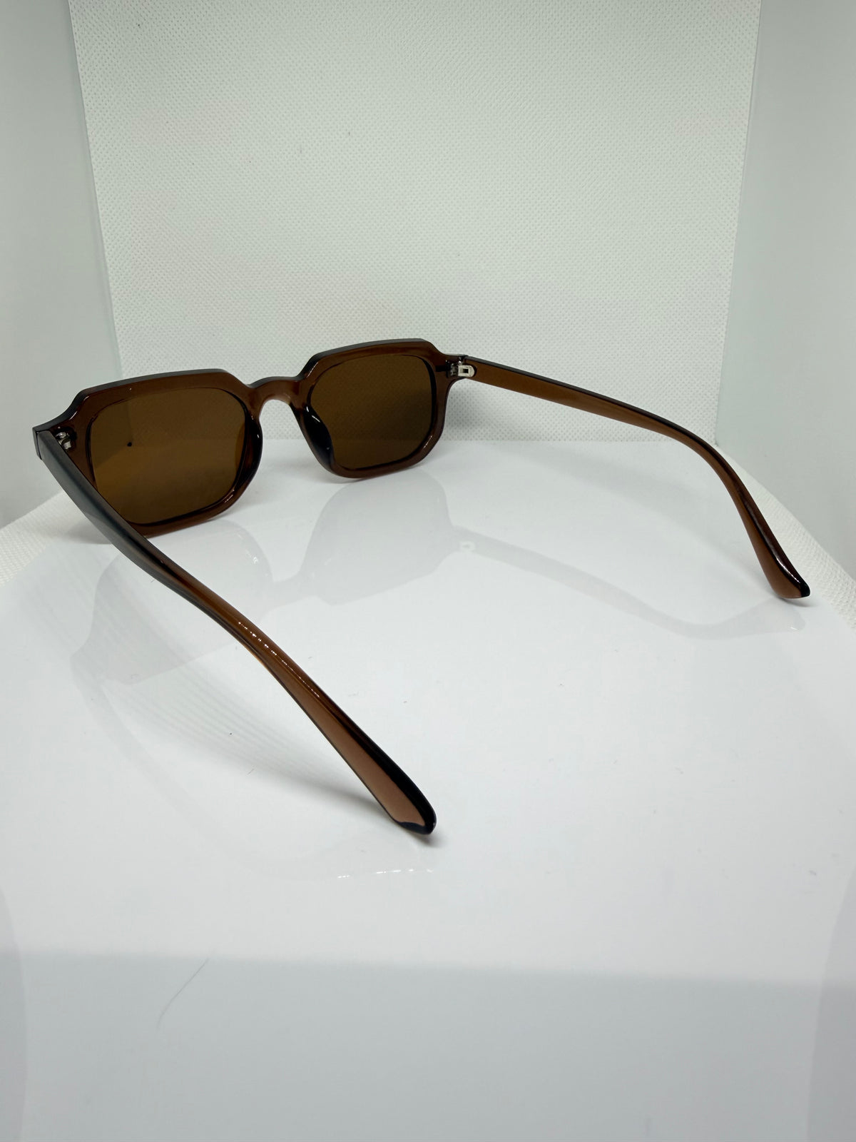 Mocha brown sunglasses with a clean rectangular shape for everyday wear