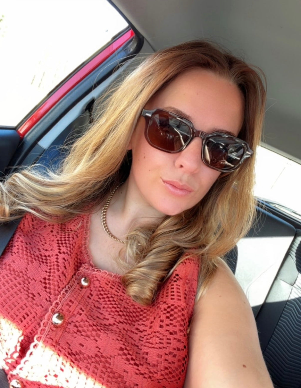 Mocha brown sunglasses displayed with a Froste branded protective pouch