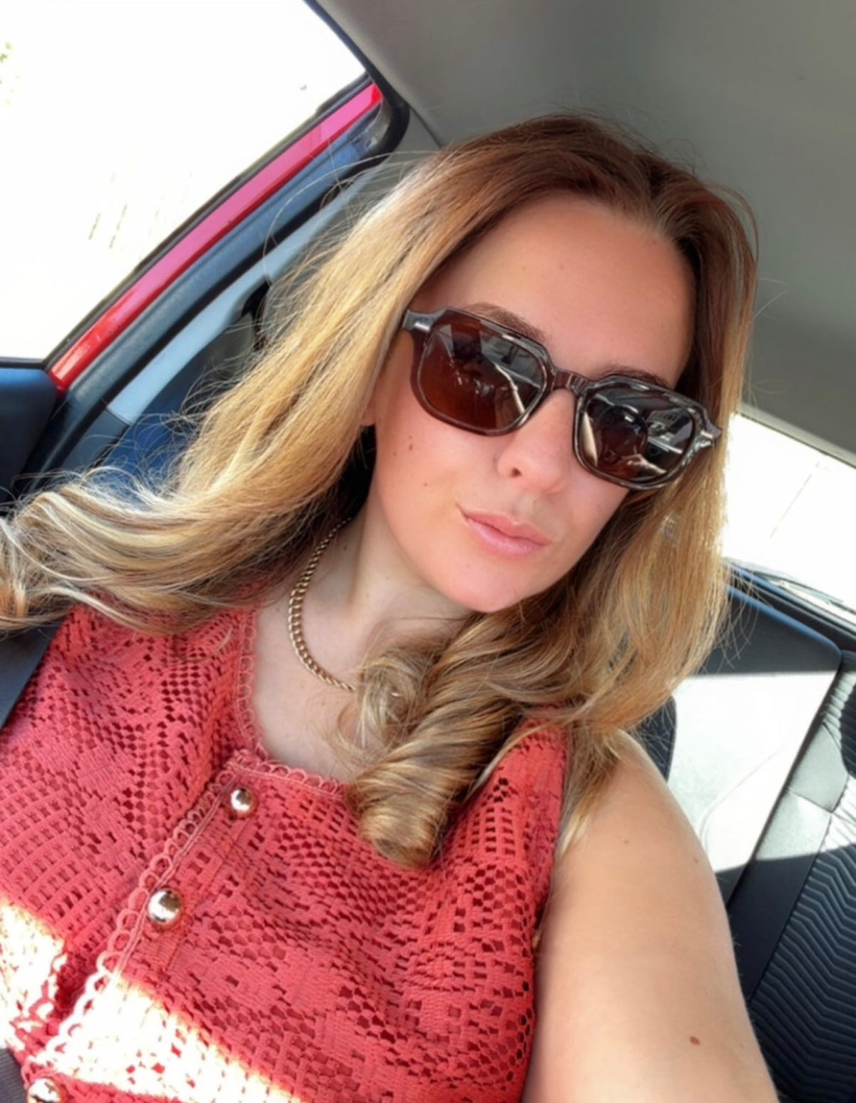 Mocha brown sunglasses displayed with a Froste branded protective pouch