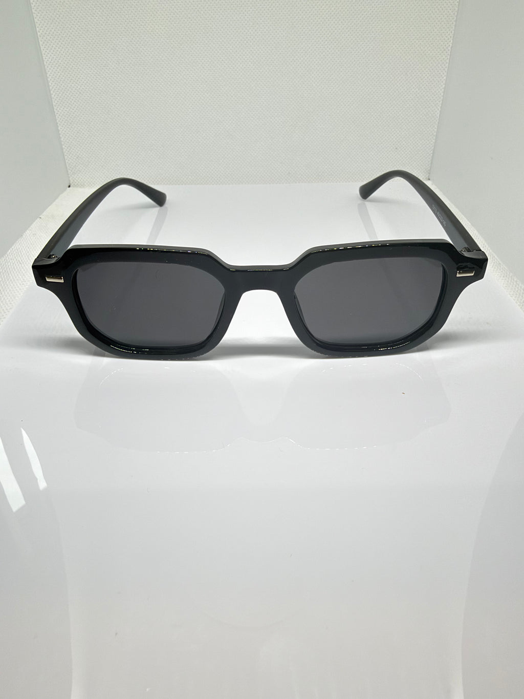 Oslo black rectangular sunglasses with dark tinted lenses