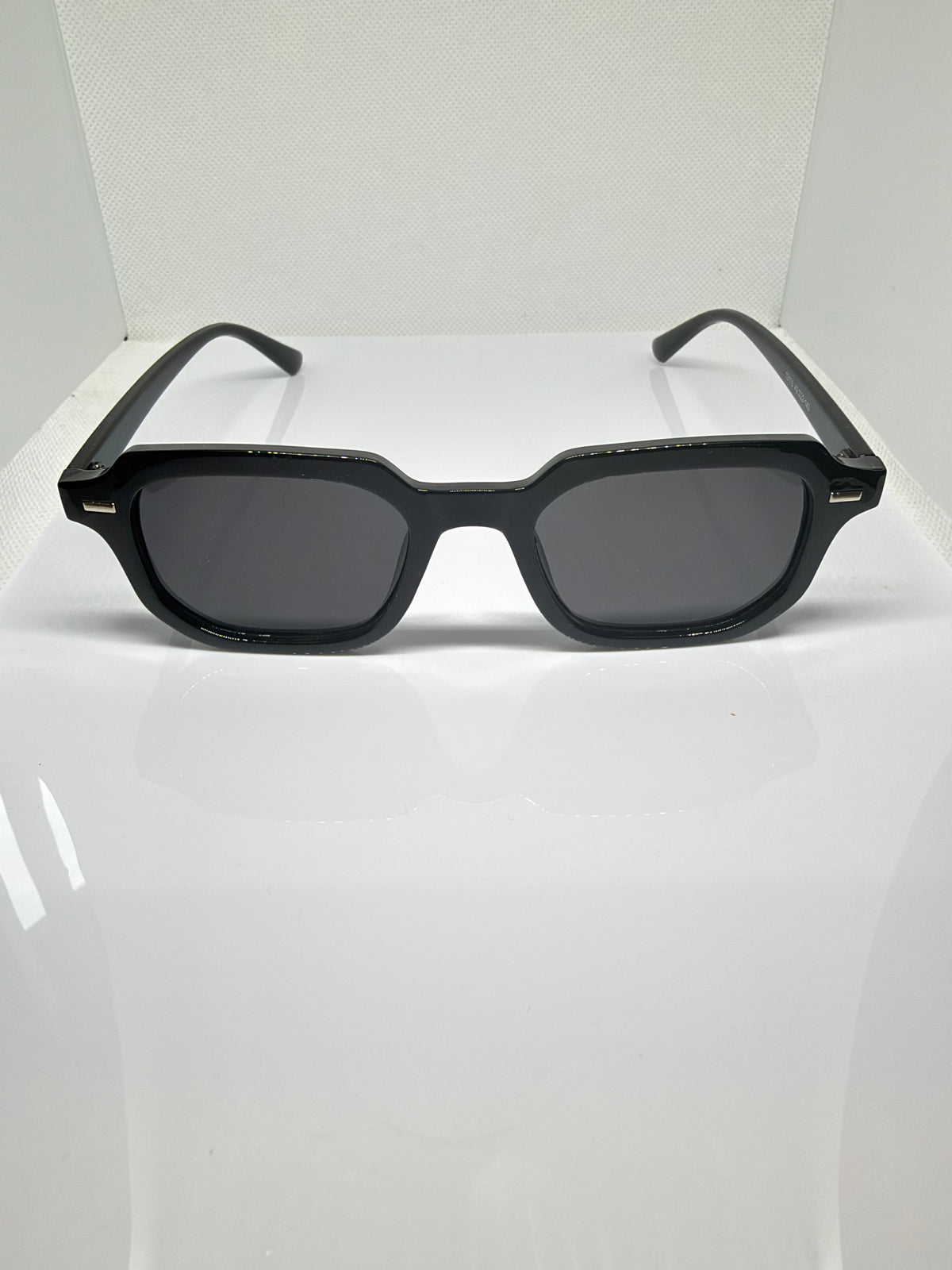 Oslo black rectangular sunglasses with dark tinted lenses