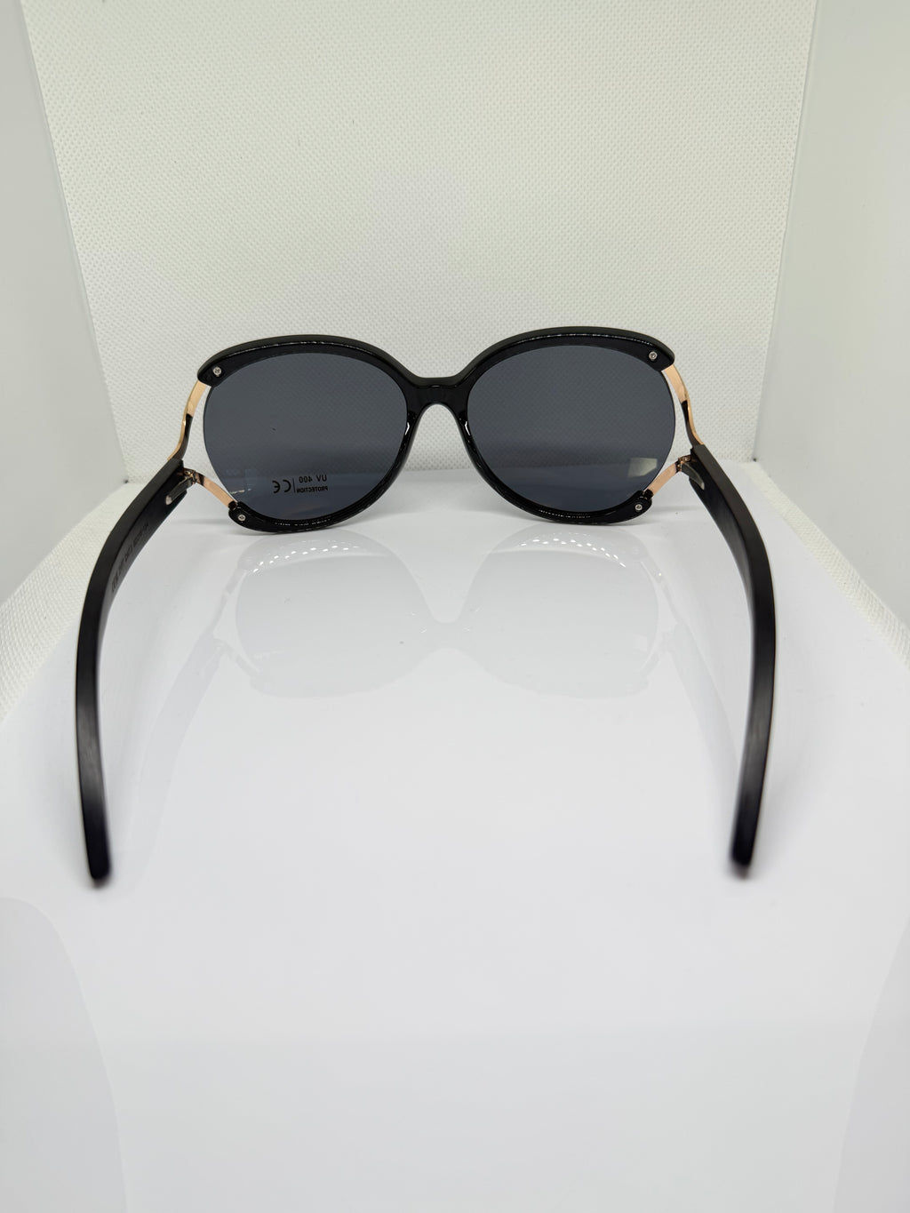 Close-up of Sorrento sunglasses showing the round frame