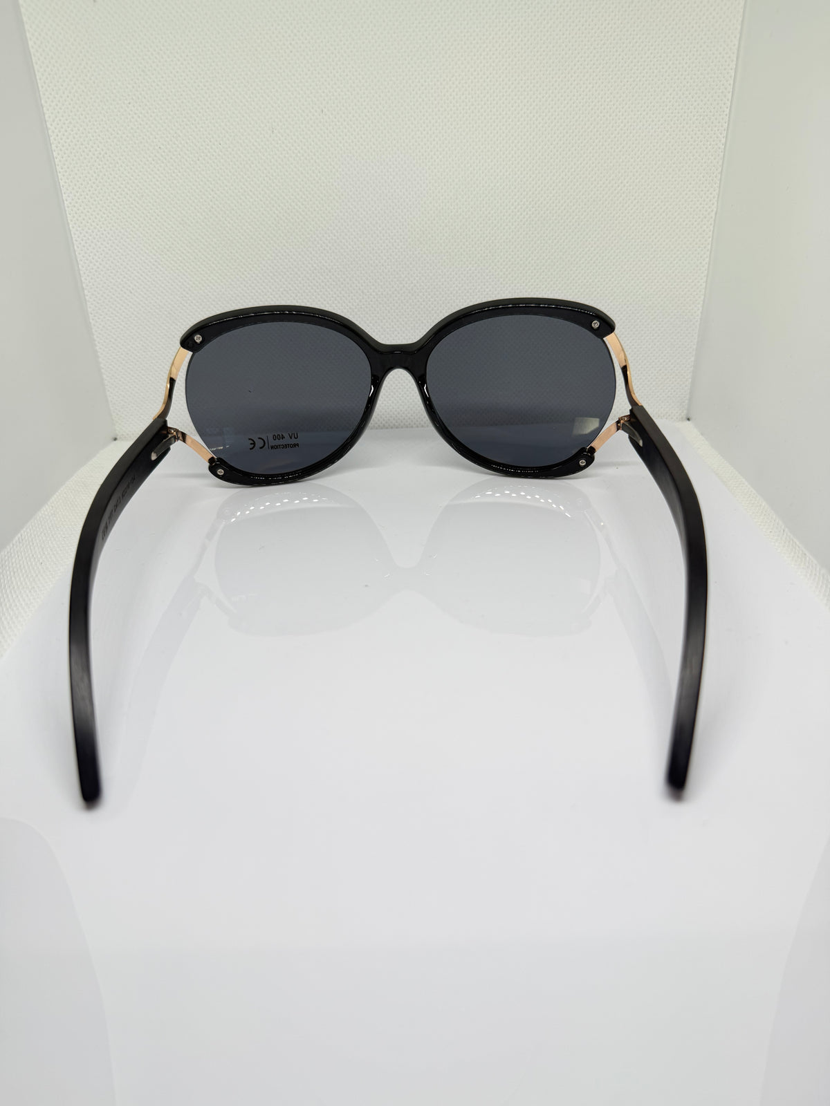 Close-up of Sorrento sunglasses showing the round frame