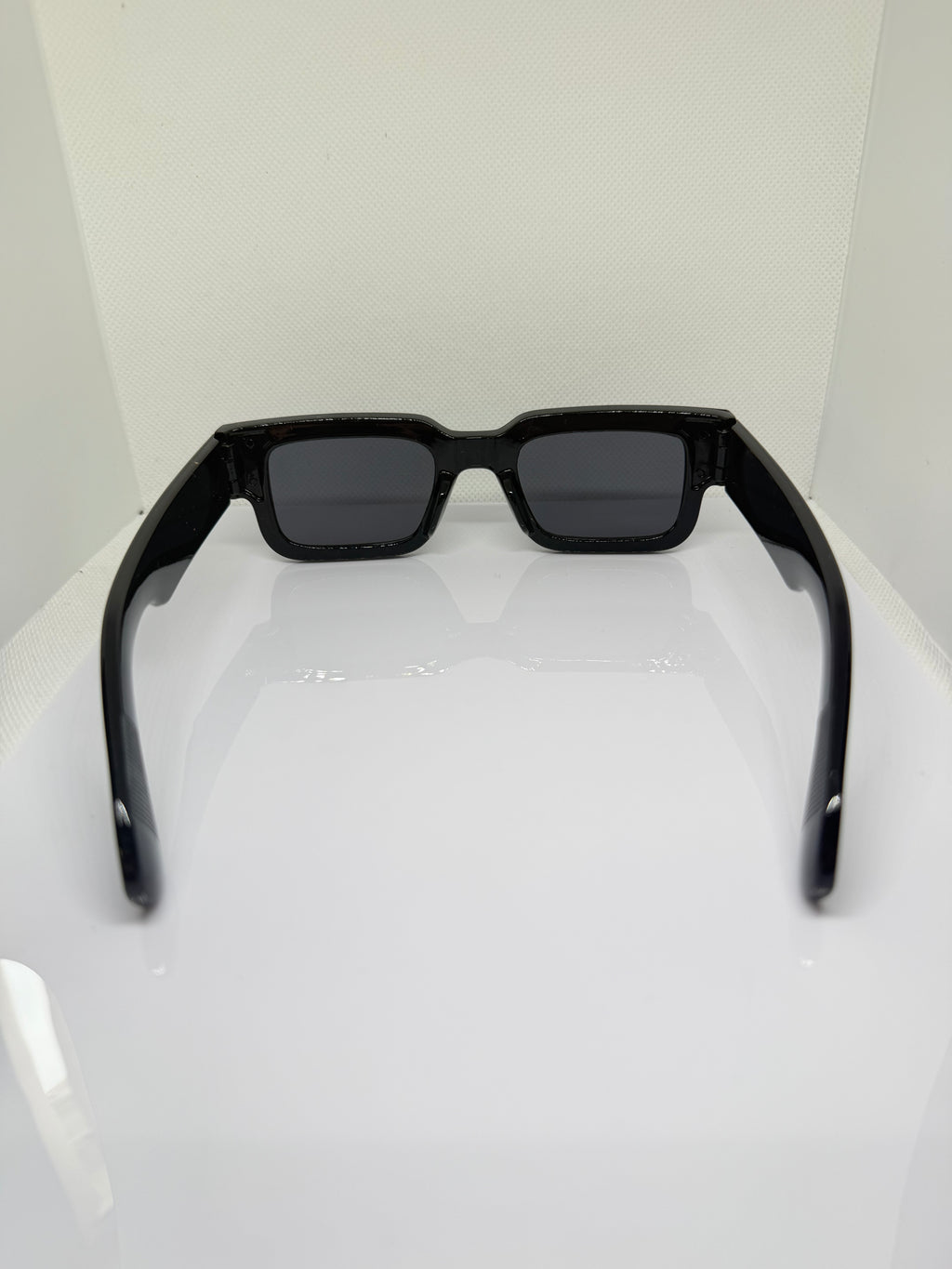 Obsidian black rectangle sunglasses with a bold statement silhouette