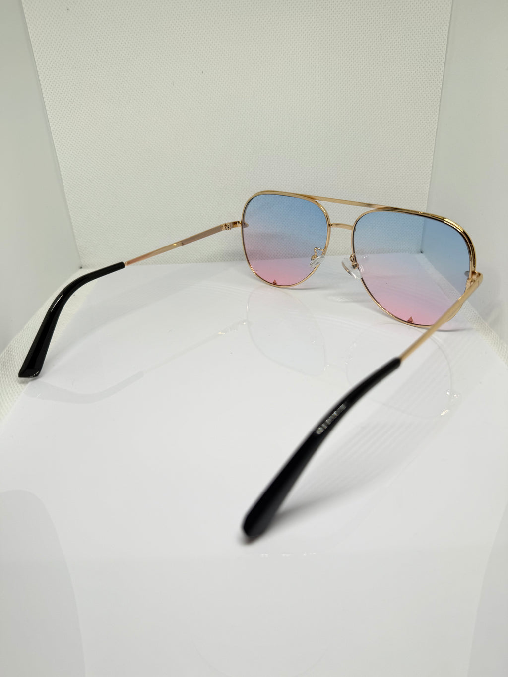 Ibiza gold aviator sunglasses with warm brown gradient lenses