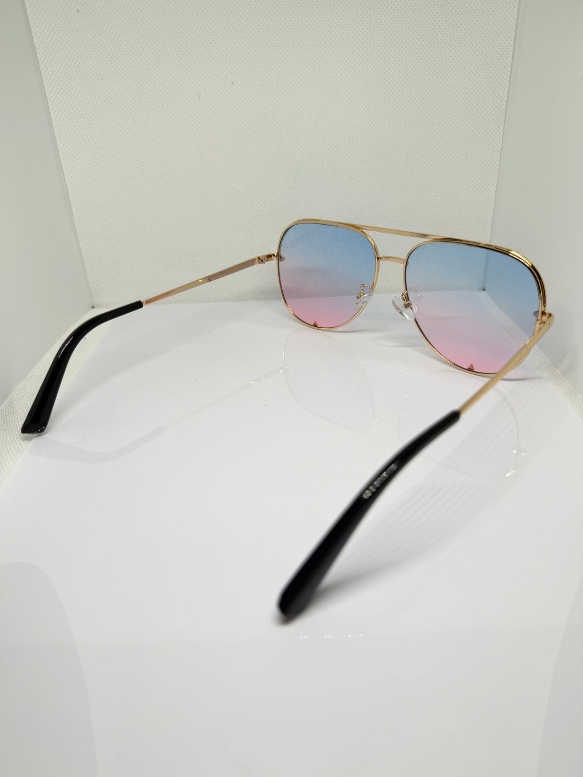 Ibiza gold aviator sunglasses with warm brown gradient lenses