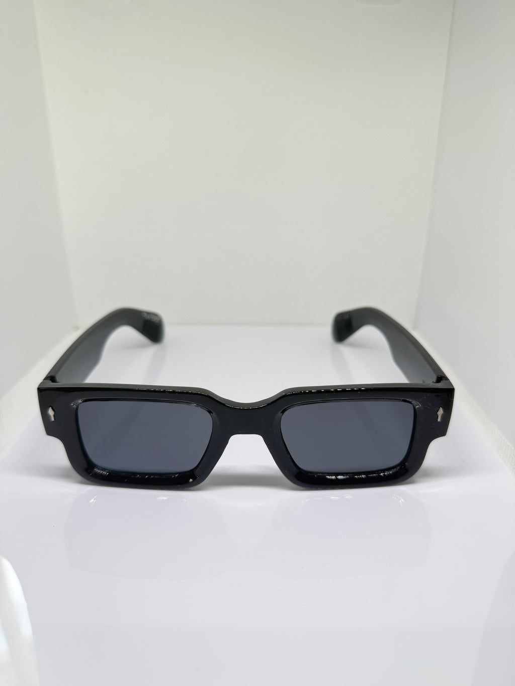 Obsidian gloss black chunky rectangular sunglasses with dark tinted lenses