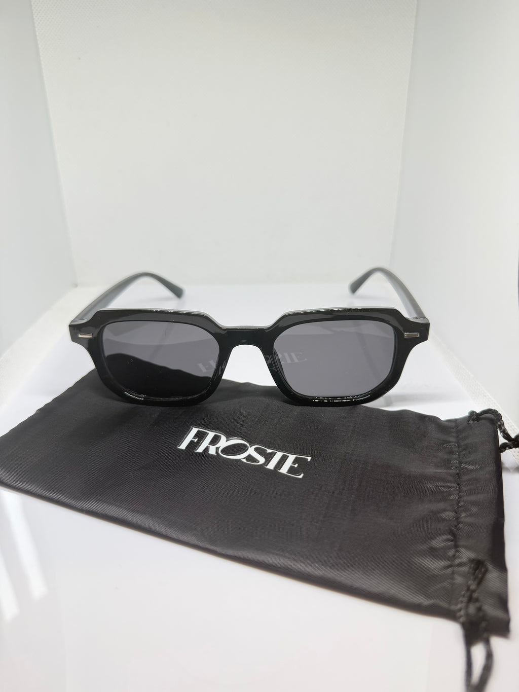 Oslo rectangular black sunglasses with a clean, understated design