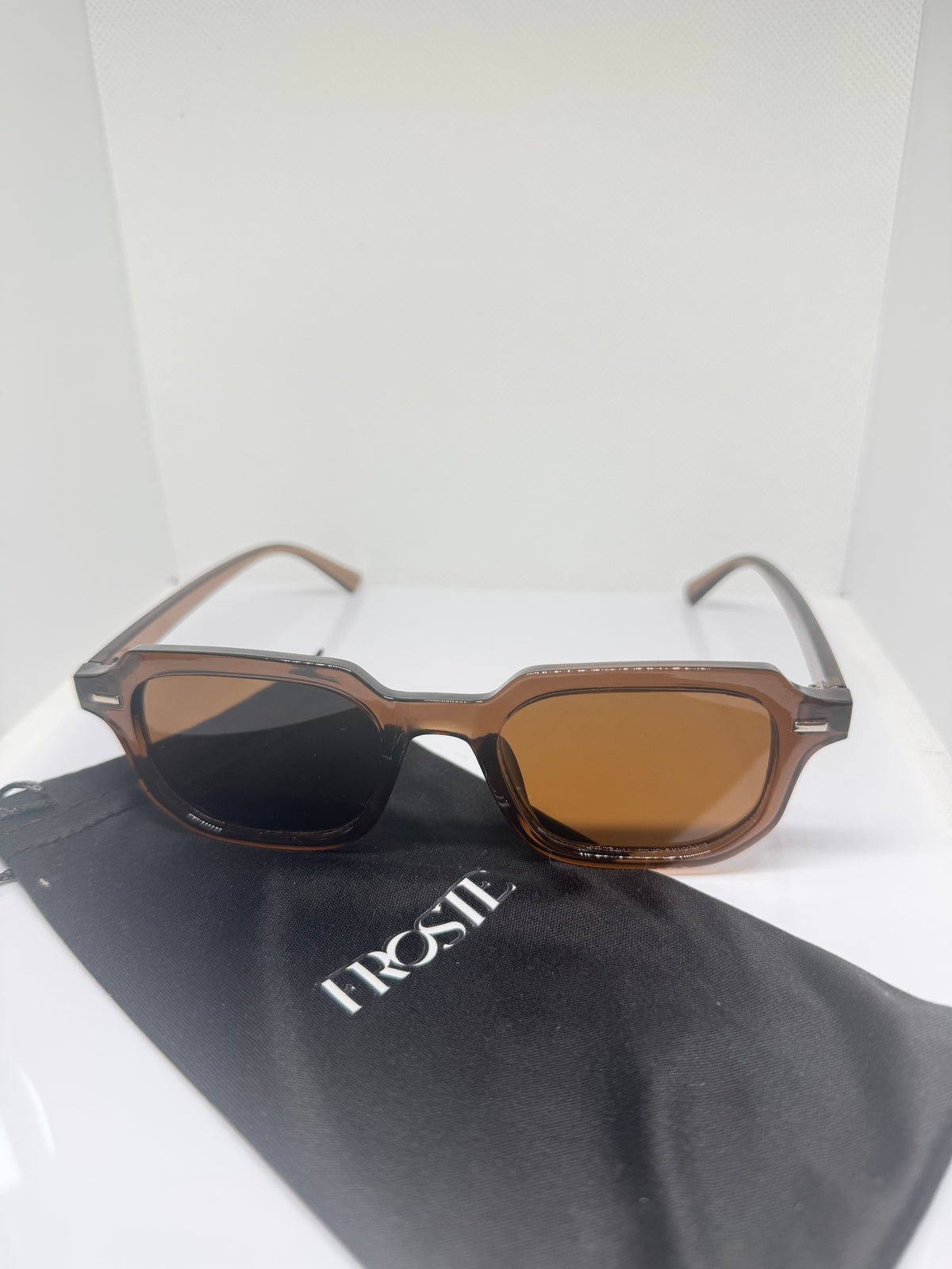 Brown rectangular Mocha sunglasses with warm tinted lenses