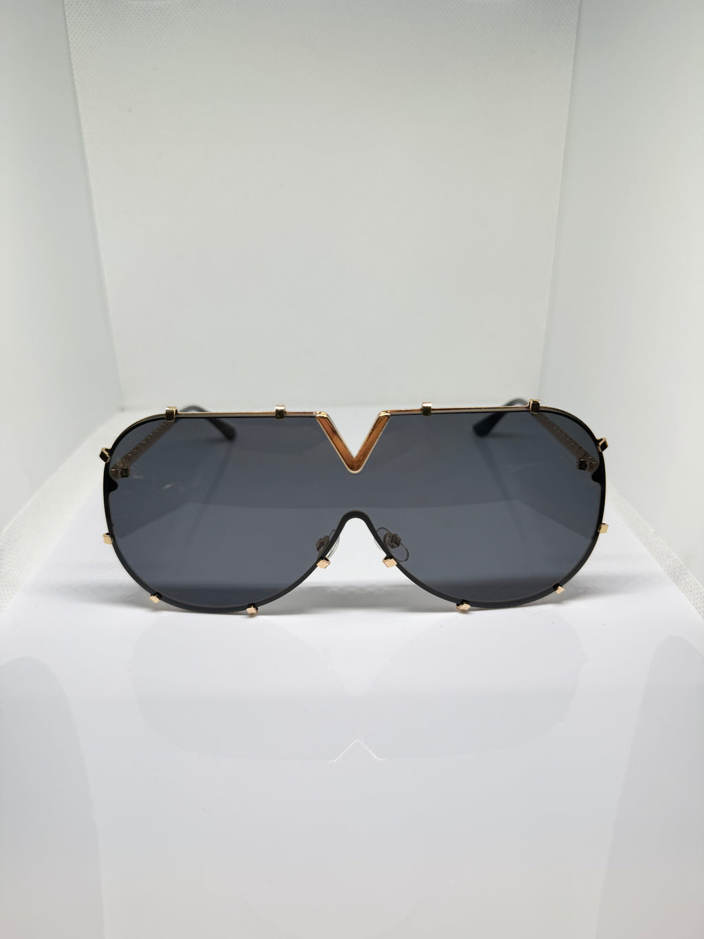 Valencia black and gold V-detail aviator sunglasses by Froste