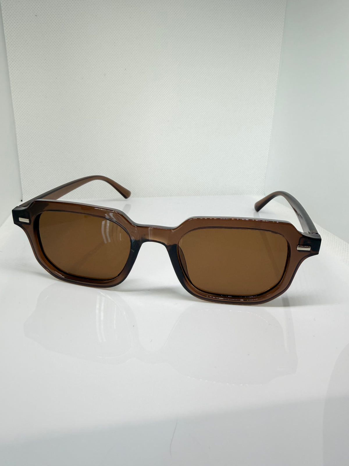 Mocha brown rectangular sunglasses with a timeless everyday style