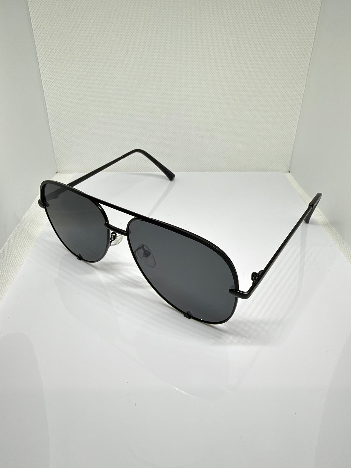 Shadow black aviator sunglasses with a sleek dark frame
