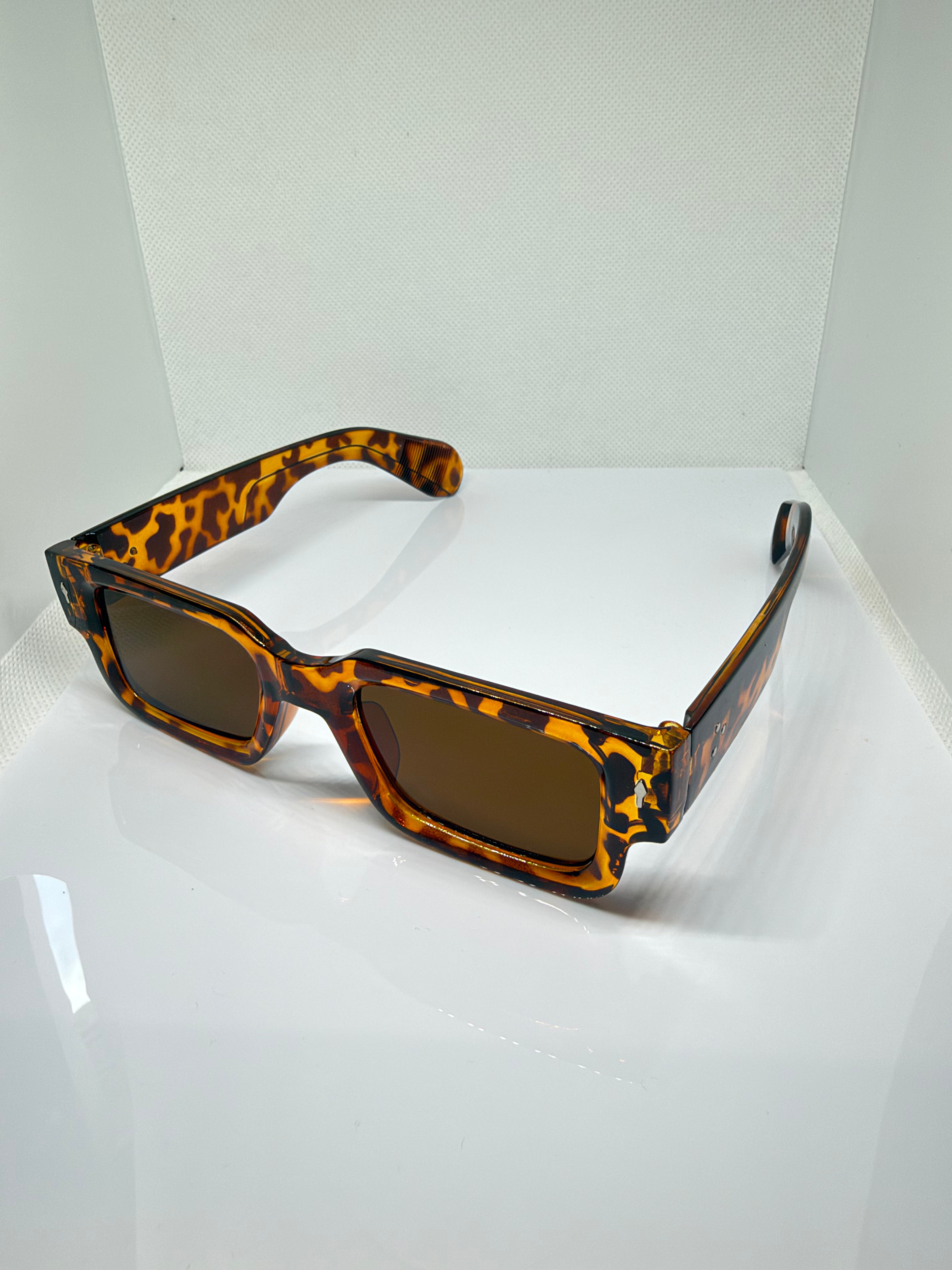 Tortuga sunglasses featuring a chunky tortoiseshell frame and brown tinted lenses